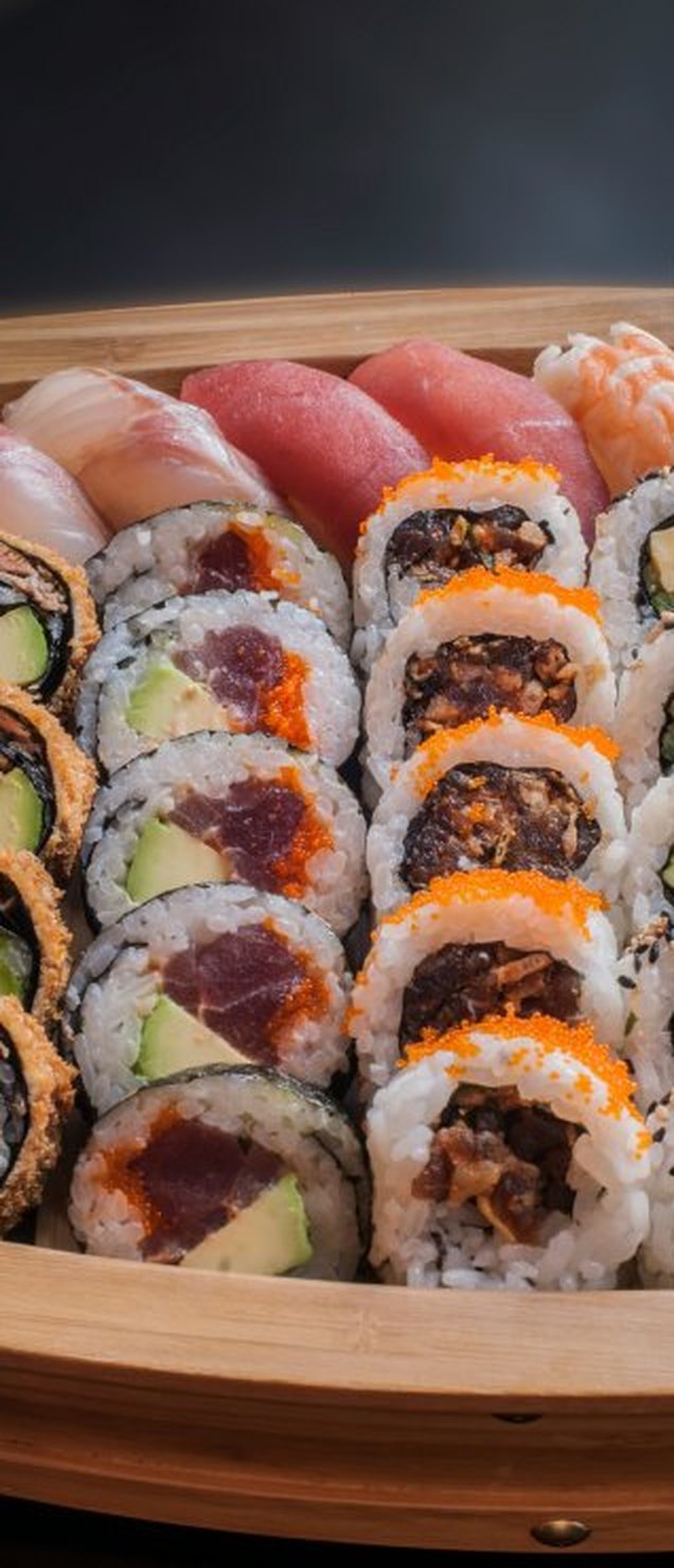Platter of maki and tempura sushi